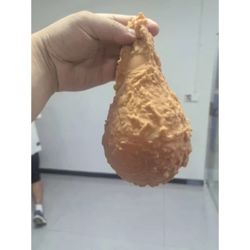 Bloc de décompression amusant en forme de jambe de poulet simulée, idéal pour pincer et masser