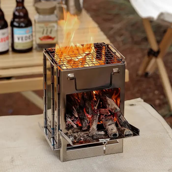 Réchaud à bois pliable compact en acier inoxydable pour camping en plein air